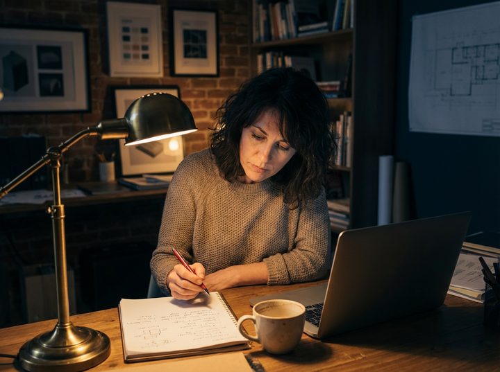 The Vigilant Delegator – agency principal late at night, red-pen reviewing a draft.